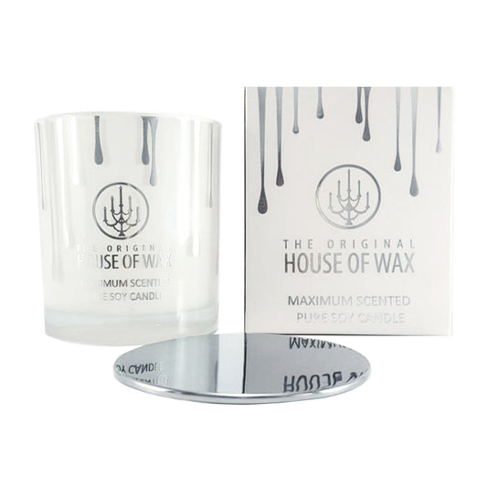 Storm Maximum Scented Pure Soy Candle with notes of: White Peony - Rain Water - Gardenia  A bouquet of white peonies, lily, jasmine, tuberose, cyclamen, and gardenia blended with sweet white grapefruit, rose crystals